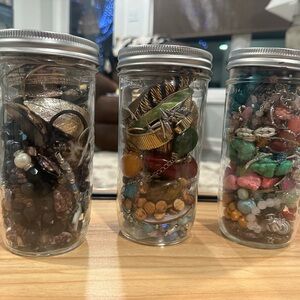 Assorted Jewelry in Glass Jars